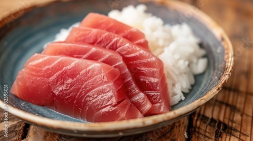 Fresh pink bluefin tuna fillet with white rice on a plate