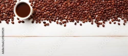roasted coffee beans form Africa map on wooden background