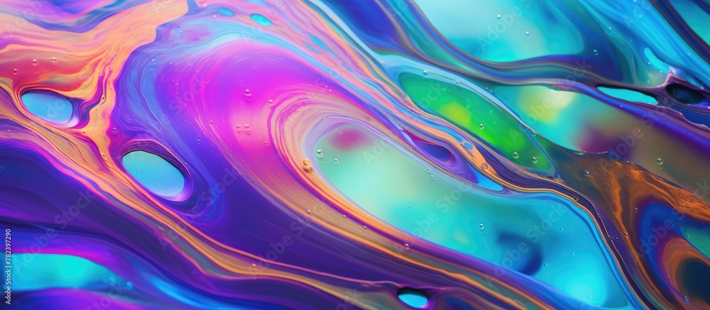 Liquid paint close-up on blue and purple background Liquid paint close-up on blue and purple background