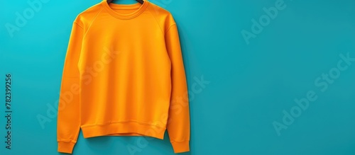 An orange long-sleeve shirt...