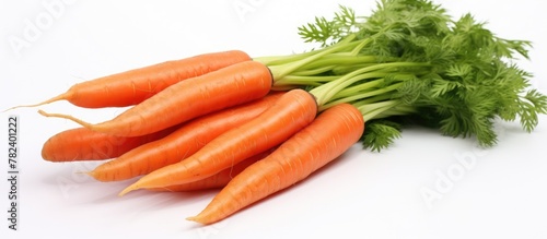 Fresh carrots on a clean wh...