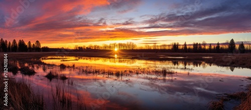 Sunset over marshy landscap...