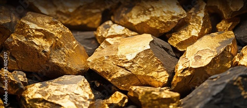 Stack of golden chunks on d...