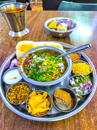 Misal Pav Famous Misal pav of pune a spicy Indian dish. Vary famous and tasty Indian dish. photo