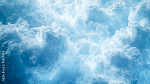Soft and fluffy cloud texture, full of lightness and unpredictability with space for text in pastel shades of blue © Malgorzata