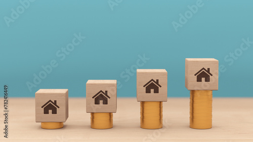 Rising real estate home prices concept Illustration with gold coin stack and wooden cube