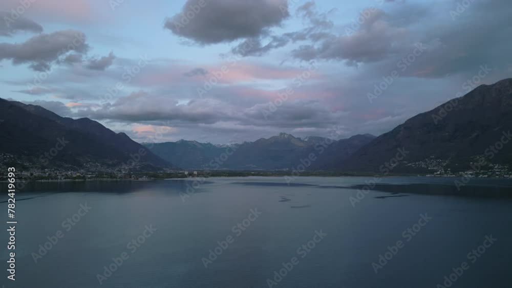 Majestic view on Swiss lake surrounded by amazing mountains with valleys and villages shooting by drone. High quality 4k footage Majestic view on Swiss lake surrounded by amazing mountains with valleys and villages shooting by drone. High quality 4k footage