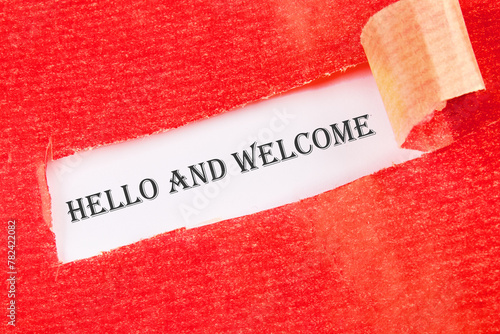 Hello & welcome text on a white background under torn paper