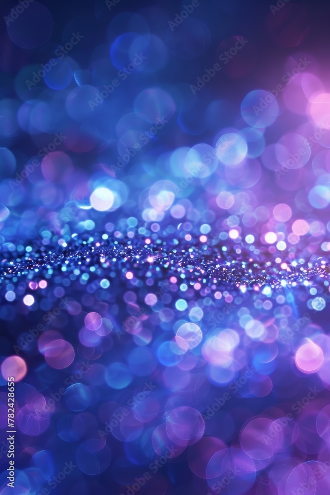 This image showcases a deep blue night-like background with a scattering of glowing bokeh lights suggesting a sense of wonder