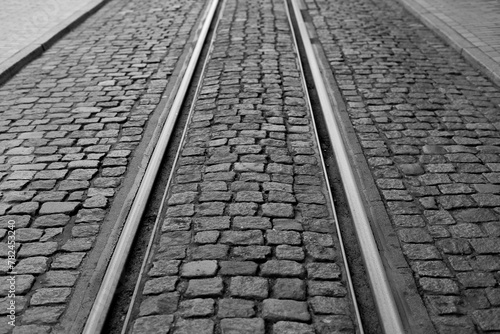 Tram tracks and cobblestones, a rare combination, travel by train