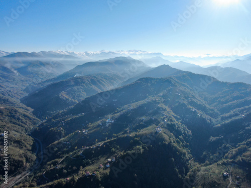 A stunning aerial view of a mountainous landscape shrouded in fog. mountains in trabzon Turkey