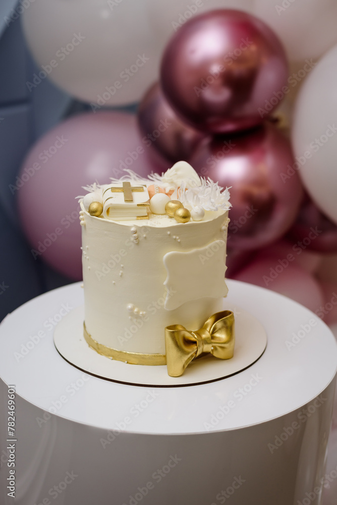 Christening cake for baby, cake with wings. Christening party candy bar Christening cake for baby, cake with wings. Christening party candy bar