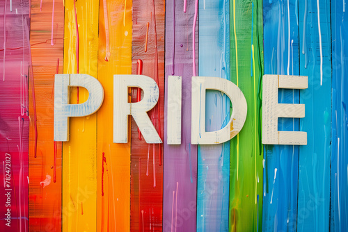 letters pride on a rainbow colorful background, symbol of homosexual, gay love, lgbt (4) photo