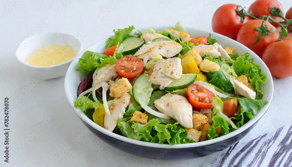 Fresh classic chicken salad with croutons and garden vegetables. Fresh classic chicken salad with croutons and garden vegetables.