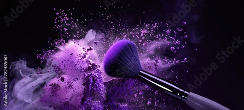 Beautiful explosion of violet powder and makeup brush on a black background. Beauty concept. Cosmetic background.