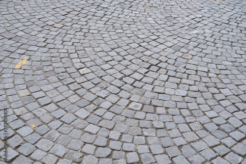Paris, France - April 2, 2024: A close-up of the cobblestones of the Champs-Elysées. © Yann Vernerie