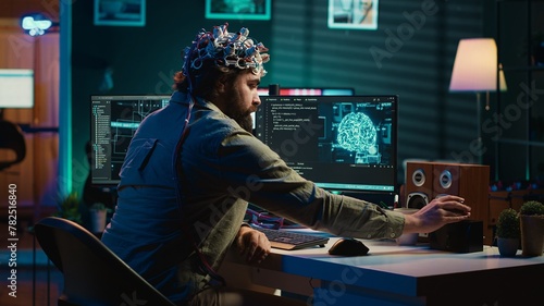 IT expert using EEG headset and machine learning to upload brain into computer, gaining immortality. Computer scientist develops AI experiment, inserting his persona into cyberspace, camera A