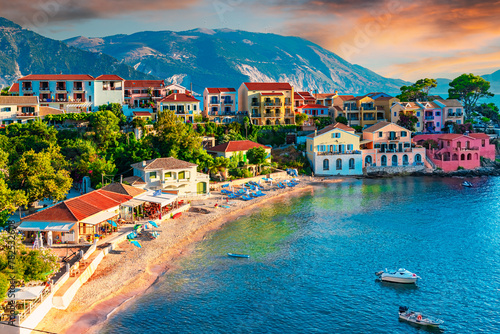 Assos, Kefalonia, Greece. Colorful houses and turquoise colored bay of a village on an idyllic Ionian island