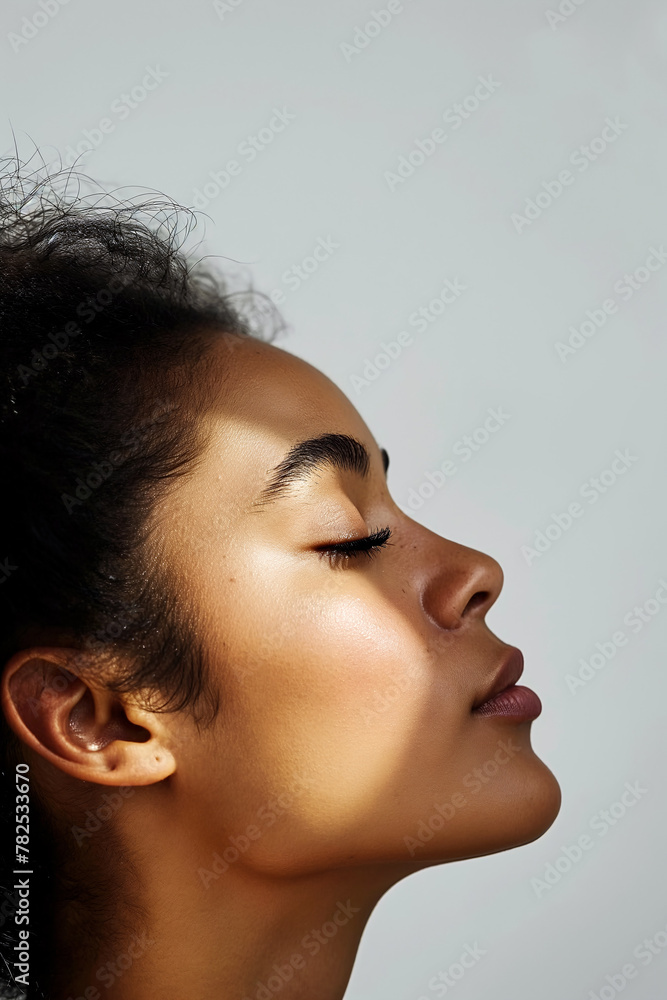 Side profile of a young african american woman, showcasing natural beauty and serene expression - Generative AI Side profile of a young african american woman, showcasing natural beauty and serene expression - Generative AI