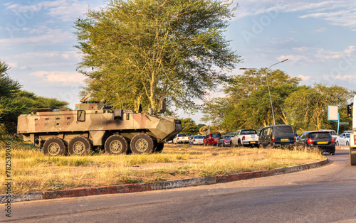 Quadro su tela military vehicle, rebels and government army in an african country, street warfa