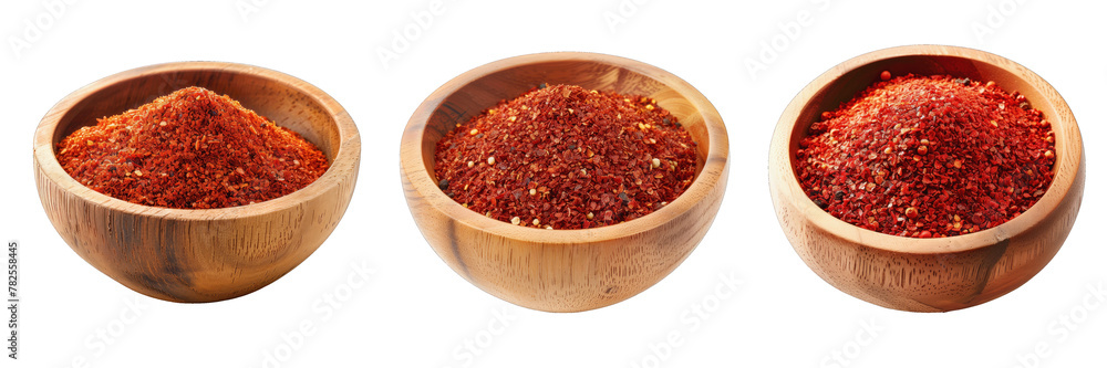 Set of ground red hot peppers in wooden plates. Hot chili pepper, ground. Transparent background, isolated image Set of ground red hot peppers in wooden plates. Hot chili pepper, ground. Transparent background, isolated image