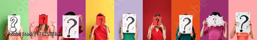 Set of people holding paper...