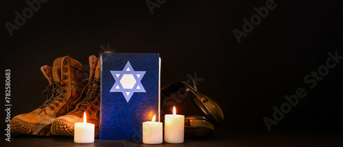 Torah with burning candles ...