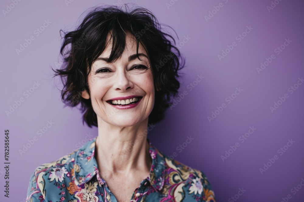 Portrait of a smiling senior woman on a lilac background. Portrait of a smiling senior woman on a lilac background.