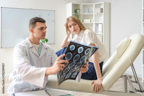 Male doctor and woman with ...