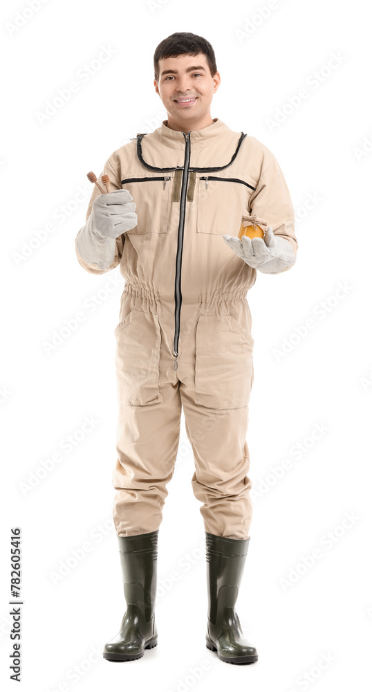 Male beekeeper with honey and spoons on white background Male beekeeper with honey and spoons on white background