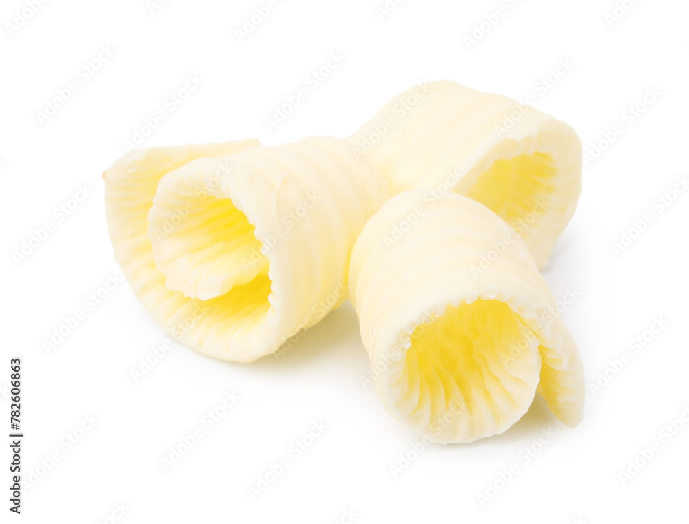Fresh tasty butter curls isolated on white Fresh tasty butter curls isolated on white