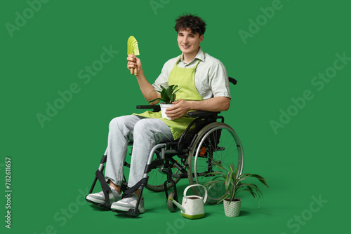 Young male gardener on whee...