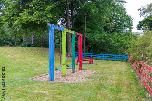 Colorful Wooden Frames for Swings, Adding a Splash of Joyful Hues to the Playground