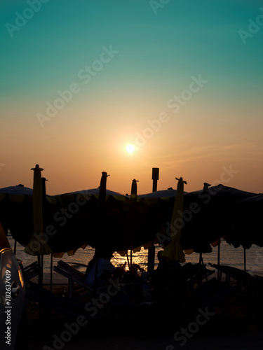 BANGSAEN,THAILAND 2024 , Bangsaen beach Sunset Tourists come to relax. The beach at Bangsaen, Chonburi Province Thailand