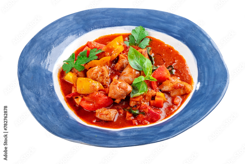 Roast chicken stew with vegetables and tomatoes served in a plate on a white background. Chakhokhbili made from chicken pieces, Georgian cuisine, close up Roast chicken stew with vegetables and tomatoes served in a plate on a white background. Chakhokhbili made from chicken pieces, Georgian cuisine, close up