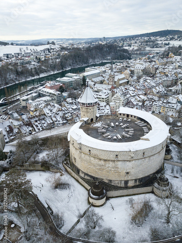 Aerial view of the Swiss old town Schaffhausen in winter, with the medieval castle Munot over the Rhine river. Munot is the landmark of this town.