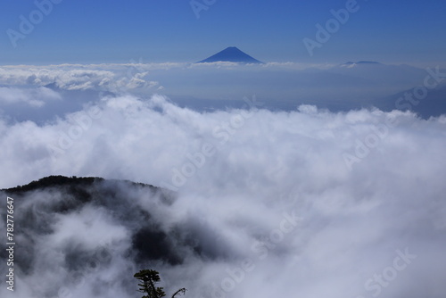 Mt.fuji floating in the sea of clouds seen from the top of Mt.Amigasa photo