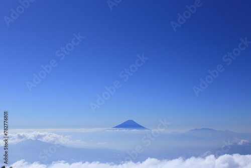 Mt.fuji floating in the sea of clouds seen from the top of Mt.Amigasa