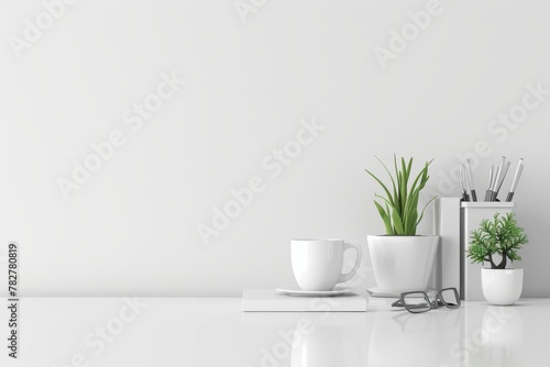Minimalist white desk with potted plant, coffee cup, and neatly arranged supplies