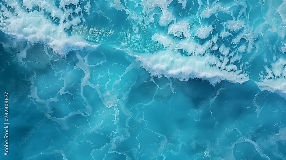 Obraz premium Blue sea texture with waves. Aerial view of ripple sea waves. Water sea or ocean for background. For Design, Background, Cover, Poster, Banner, PPT, KV design, Wallpaper, news