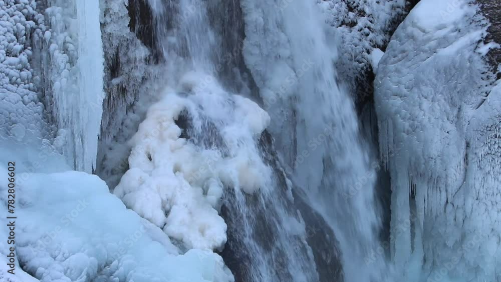 Beautiful ice formation on rock at Helgufoss waterfal, Southern Iceland. 2024 Beautiful ice formation on rock at Helgufoss waterfal, Southern Iceland. 2024