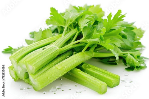 A bunch of fresh, green celery stalks, isolated on a white background, with water droplets highlighting their freshness.