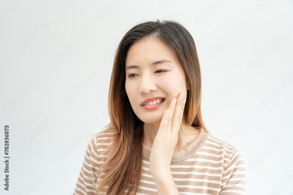 Asian woman feel toothache from gingivitis, female suffer tooth, decay problems, dental care. sensitive tooth, decay problem, bad breath, Gingival Recession, Oral Hygiene instruction, tooth extraction Asian woman feel toothache from gingivitis, female suffer tooth, decay problems, dental care. sensitive tooth, decay problem, bad breath, Gingival Recession, Oral Hygiene instruction, tooth extraction