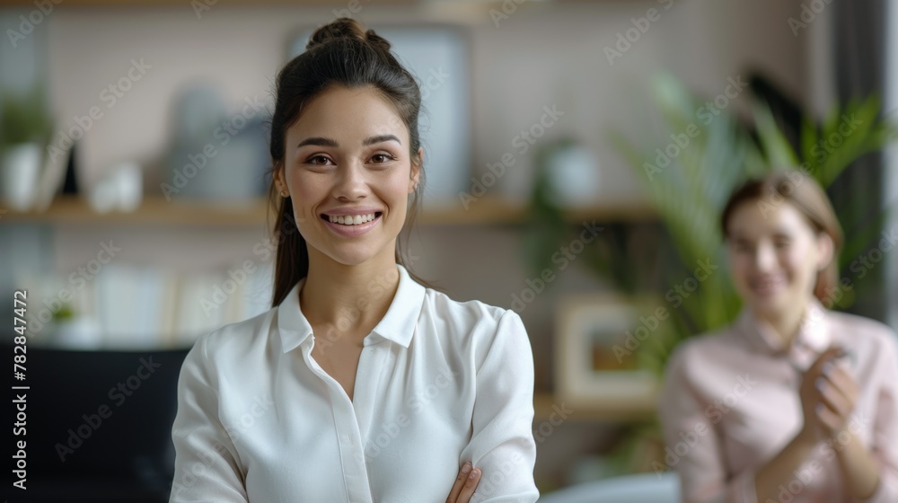 Professional woman in office, confident and smiling, career-oriented. Professional woman in office, confident and smiling, career-oriented.