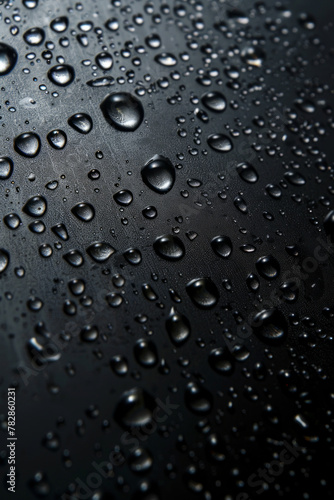 Water droplets on a black background