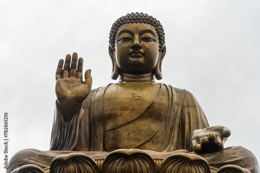 Fototapeta premium The Big Buddha or Tian Tan Buddha Staue locate on the hill of Lantau Islands at Tung Chung , Hongkong : 28 March 2024