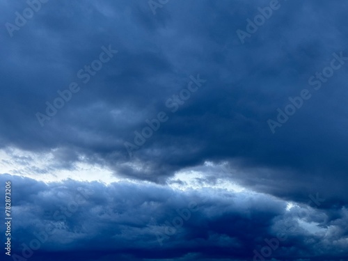Sky with dramatic dark and stormy clouds.
