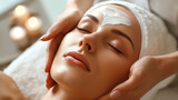Relaxing Facial Treatment: Woman Receiving a Cosmetic Face Mask