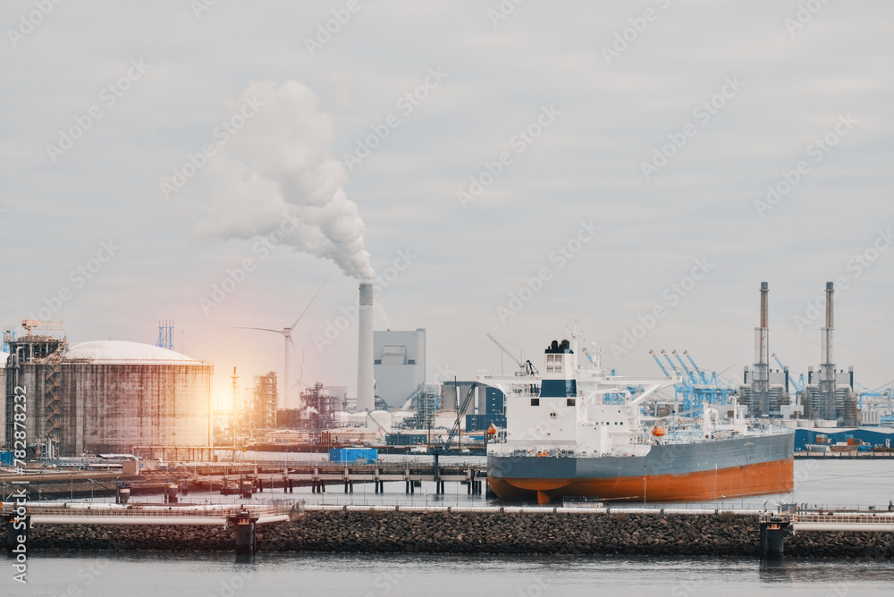 Obraz premium Very Large Crude Oil Carrier Tanker In The Trade Port During Bunkering Fuel Operations.