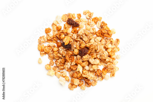 Pile of Muesli oat cereals with raisins, dried fruits and sunflower seeds on white background. Top view